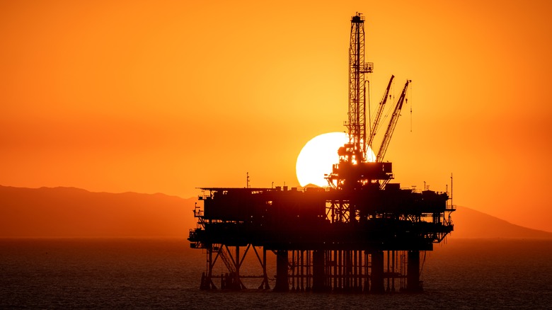 offshore oil rig at sunset