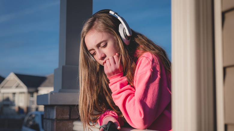 girl wearing headphones