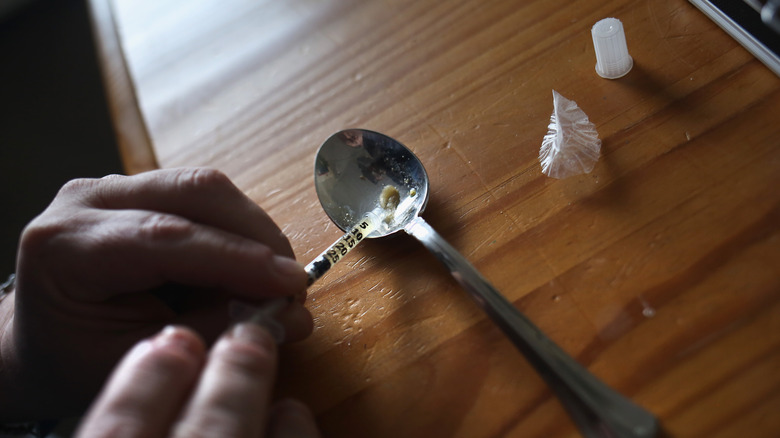 Heroin being prepared