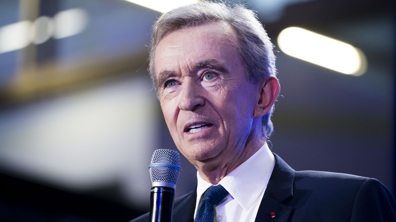 Bernard Arnault holding mic