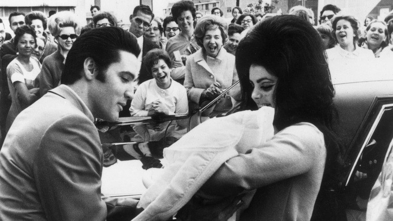 Elvis and Priscilla with baby