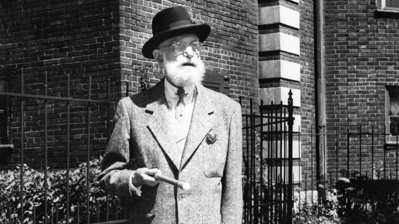 Old Joseph "Yellow Kid" Weil suit hat beard standing outside