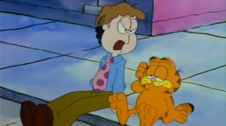 Jon yells at Garfield on curb