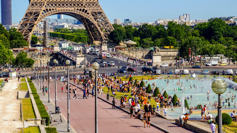 People bathing in front of the Eiffel Tower