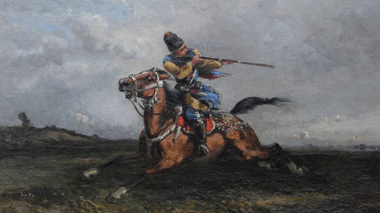 Circassian horseman holding gun