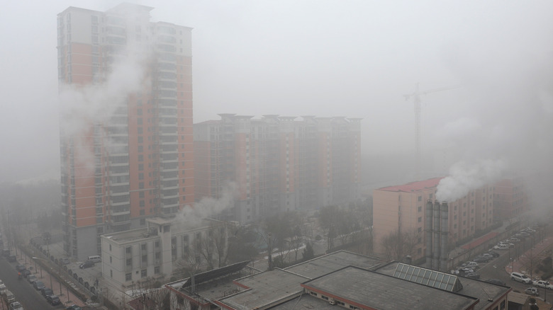 Smog surrounding skyscrapers in China