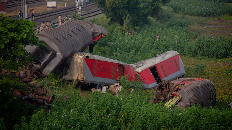 Odisha train derailment wreckage in field