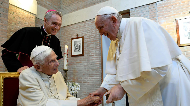 Pope Benedict with Pope Francis