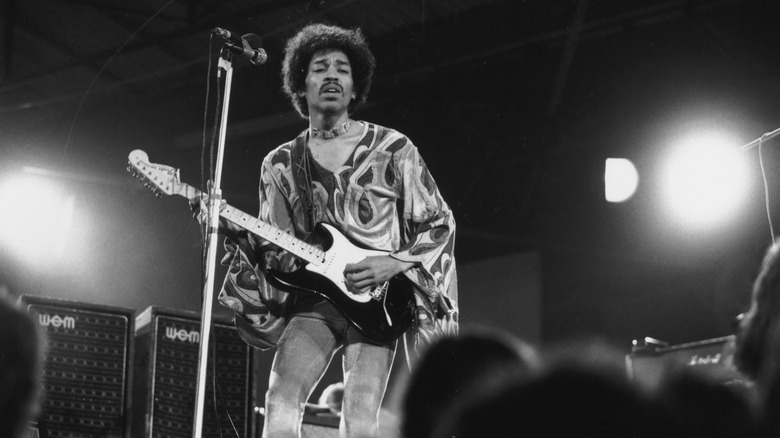 Jimi Hendrix performing