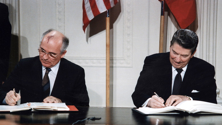Mikhail Gorbachev and Ronald Reagan signing the INF Treaty 