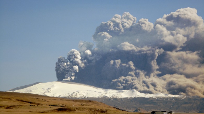 Volcanic ash erupting billowing clouds