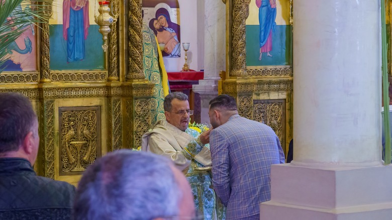 Communion at Melkite Mass, Haifa Israel