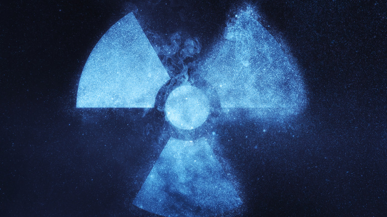 blue radiation symbol black background