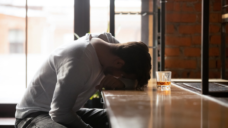 Man holding whiskey