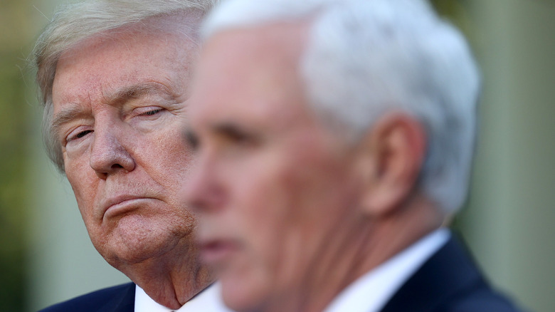 Donald Trump glares at Mike Pence