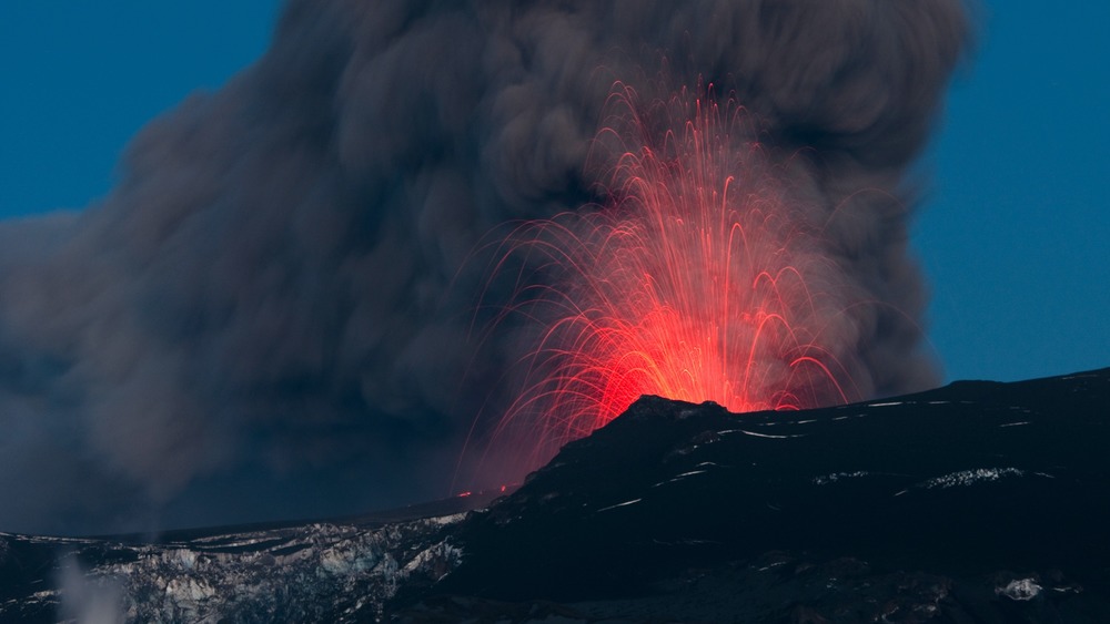 volcanic eruption with fire and smoke