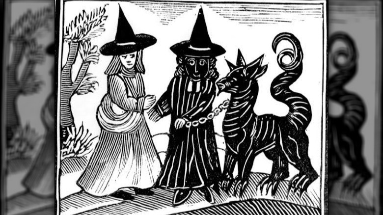 A white-faced witch meeting a black-faced witch