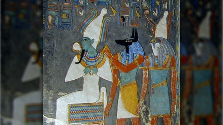 anubis and horus behind osiris