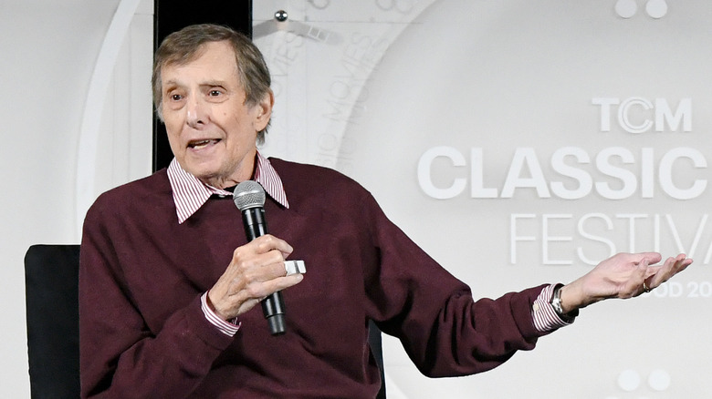 William Friedkin gestures while speaking