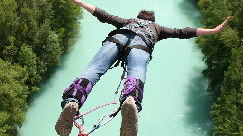 bungee jumping over a river