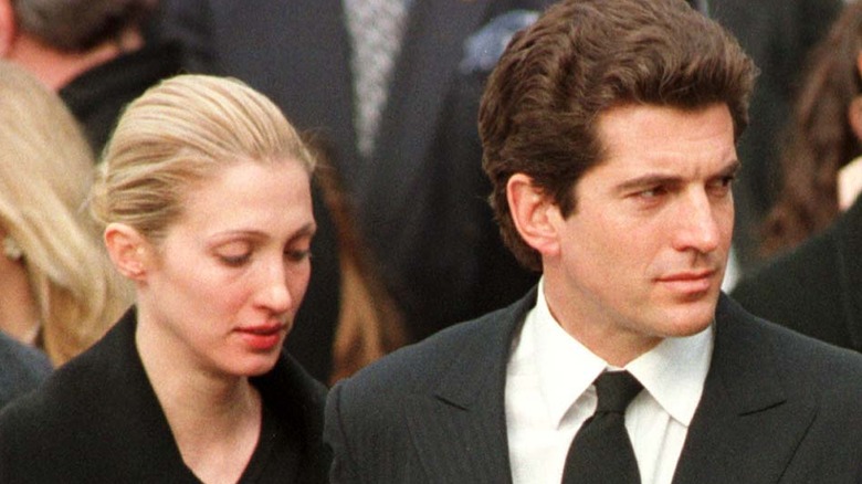 Carolyn Bessette and JFK Jr look down