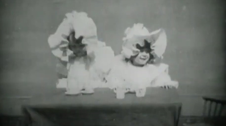 Two young girls tea party