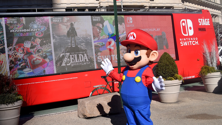 Nintendo Switch ads on a bus with Mario