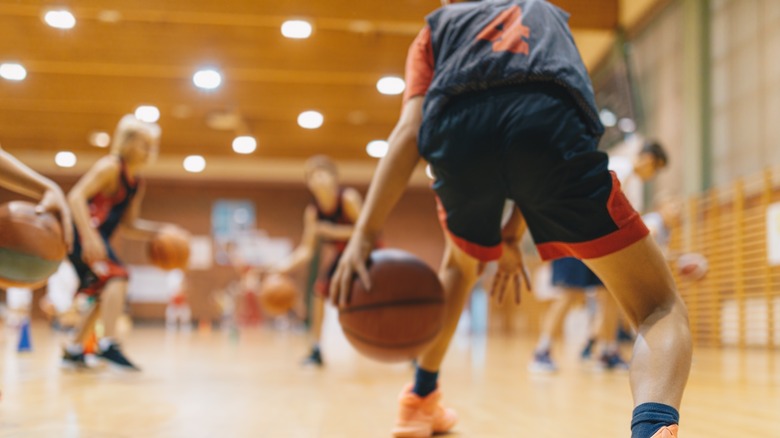 Young basketball player practicing