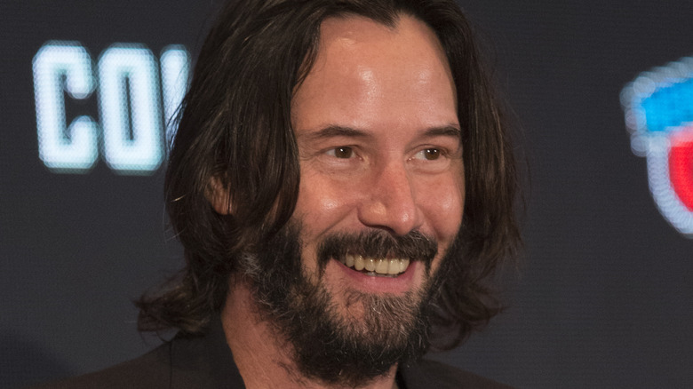 Keanu Reeves smiling