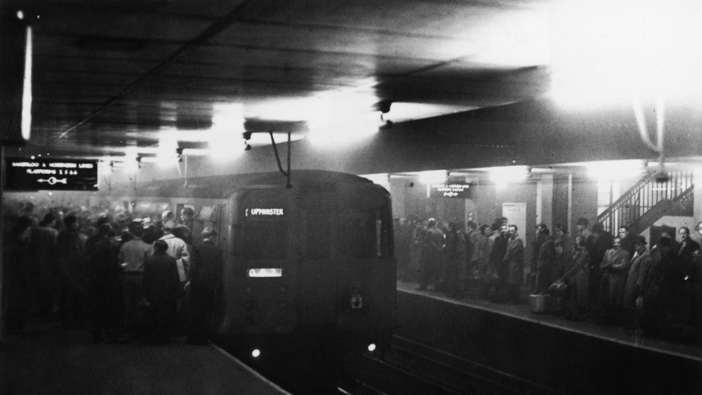 People huddled underground avoiding smog.