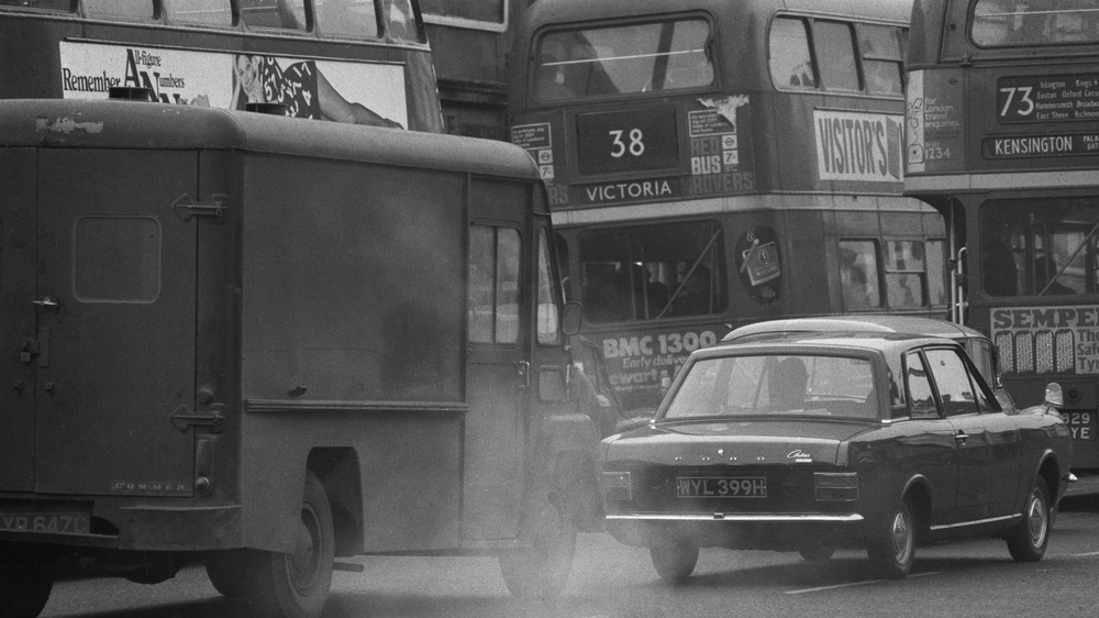 Busses on the road during smog.