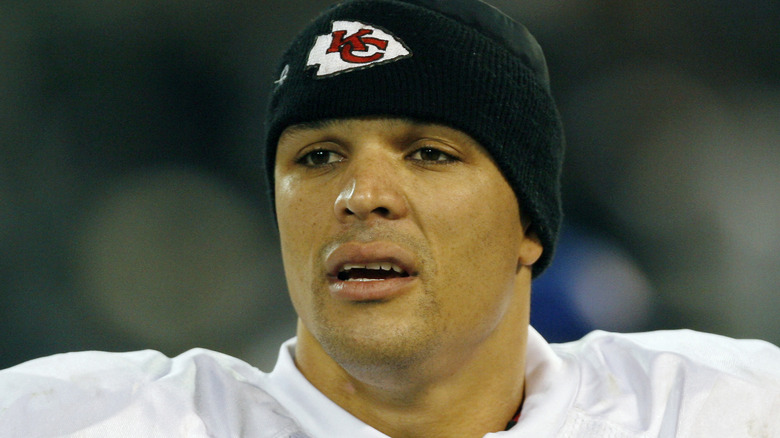 Tony Gonzalez black beanie white shirt