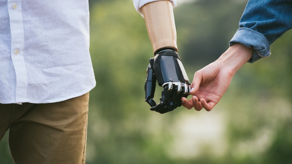 prosthetic touch hands holding