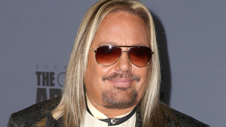 Vince Neil smiling sunglasses