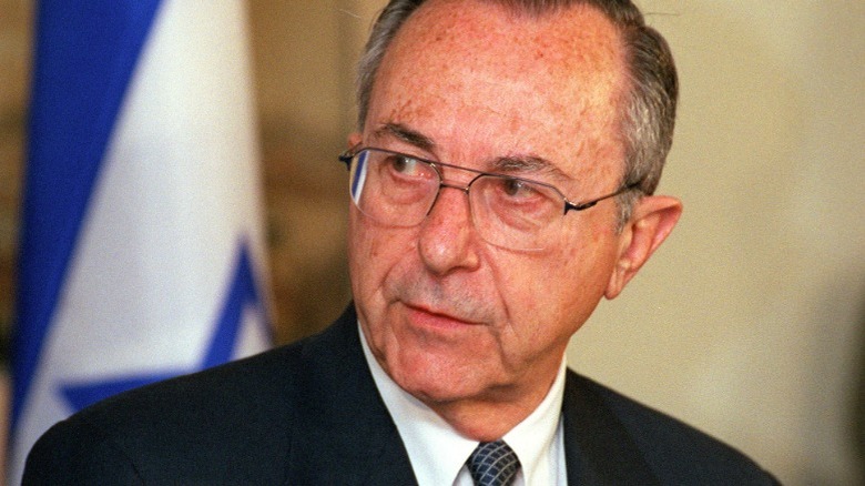 Israeli Minister of Defense Moshe Arens speaking at a press conference at the Pentagon