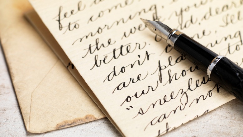 Fountain pen on written letter