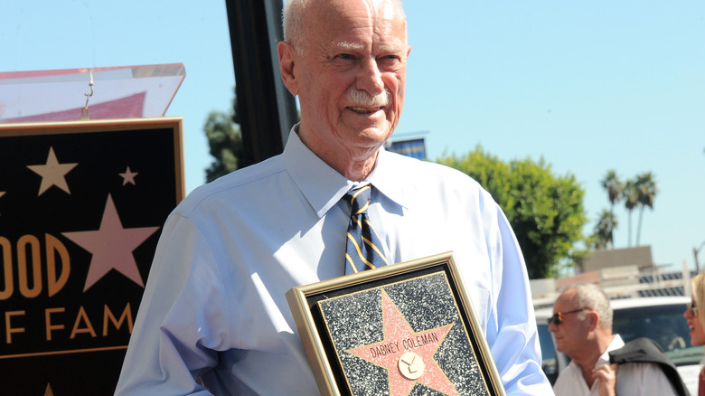 Dabney Coleman holding Walk of Fame plaque