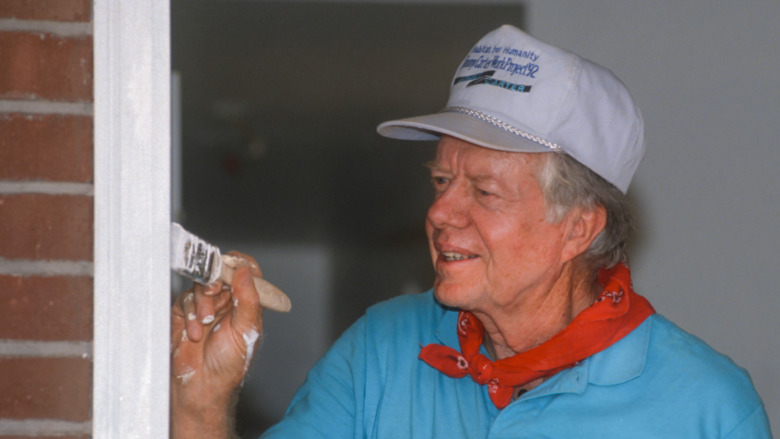 jimmy carter painting a house