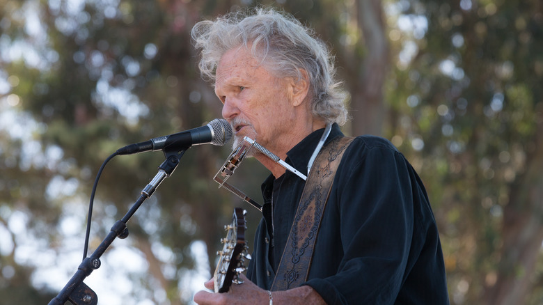 Kris Kristofferson at microphone