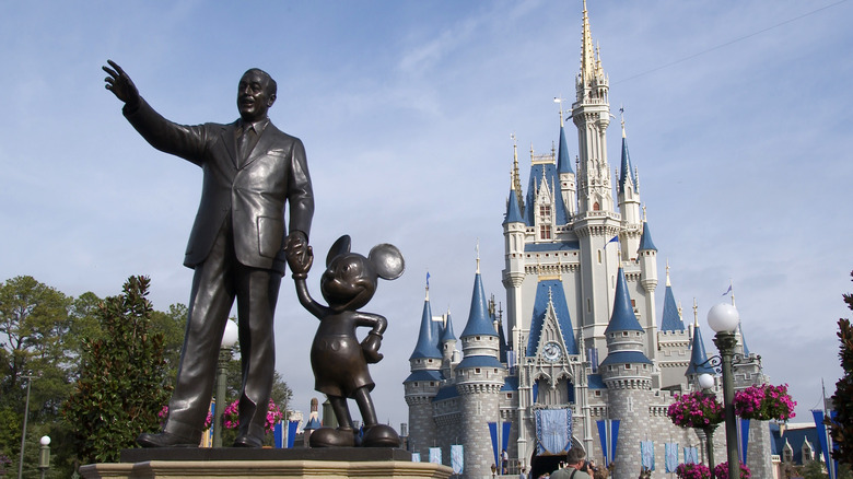 Disney World castle and statue