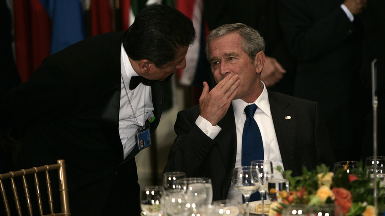 President George W Bush at dinner wineglasses