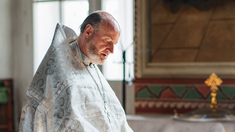 priest in ceremonial cassock