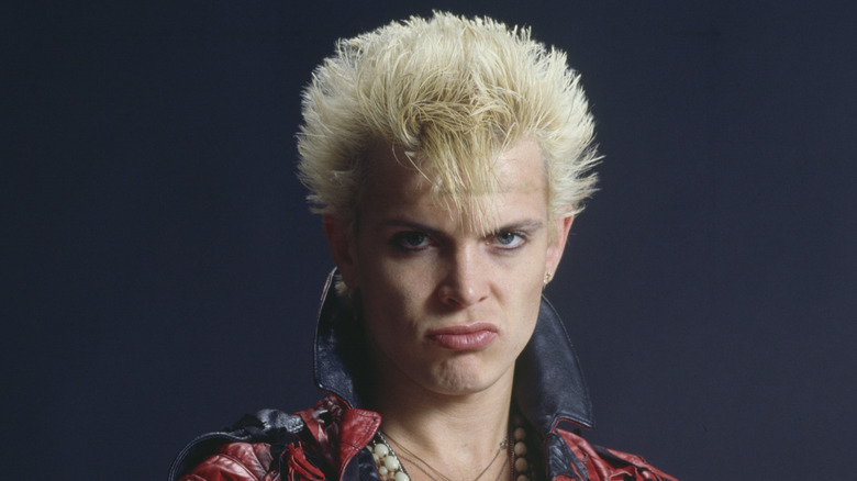 billy idol sneering with popped collar in 1980s