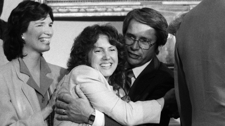 christa mcauliffe hugging another teacher