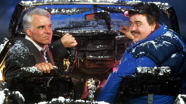 steve martin and john candy in destroyed car in planes, trains, and automobiles