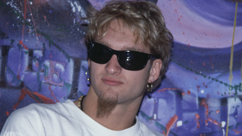 Layne Staley in sunglasses and t-shirt staring off