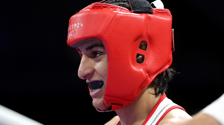 Imane Khelif mouthguard red boxing helmet