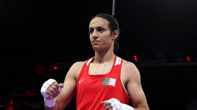 Imane Khelif red boxing jersey in ring