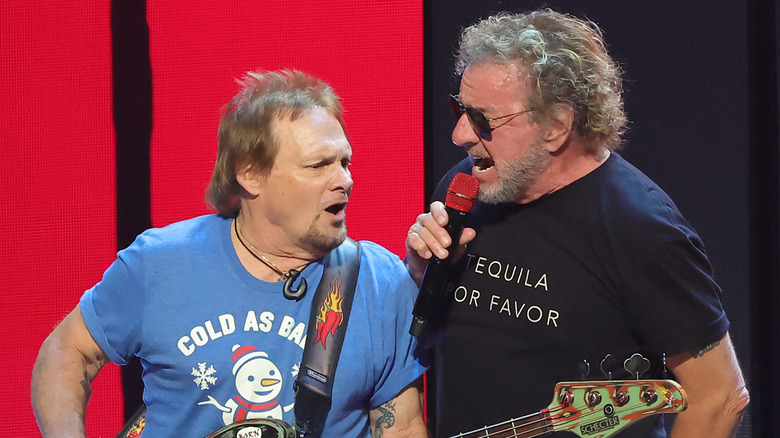 michael anthony and sammy hagar singing together onstage