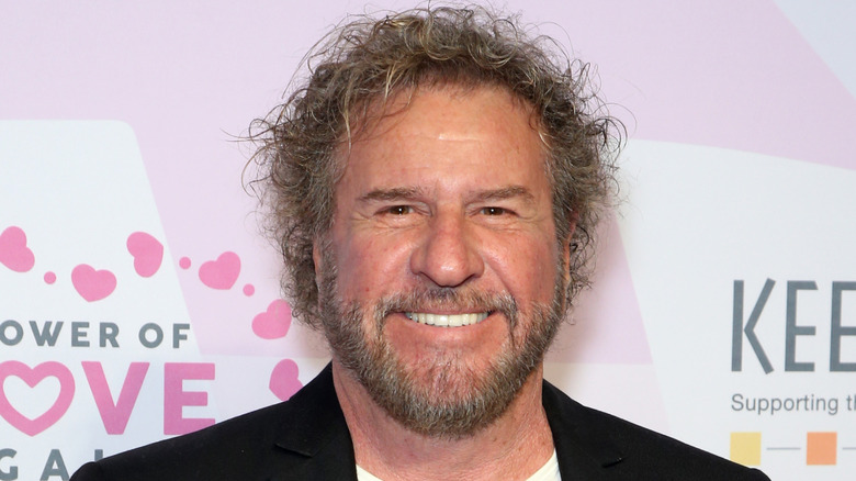 sammy hagar smiling in black blazer